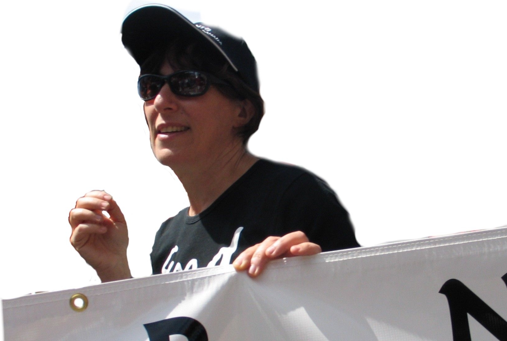 Miriam Garfinkle at demonstration holding Solidarity banner
